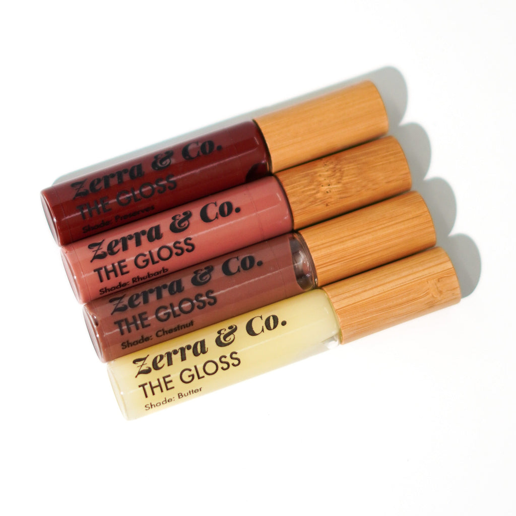 Set of Zerra & Co. lip glosses on a white background